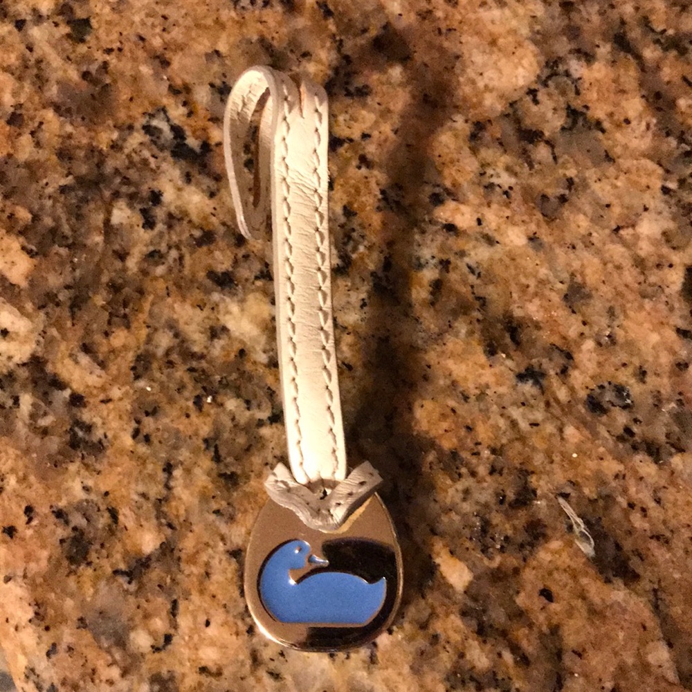 Dooney & Bourke logo leather pendant